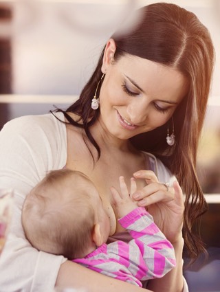 Breastfeeding in public is protected by law. Baby should each whenever he gets hungry.